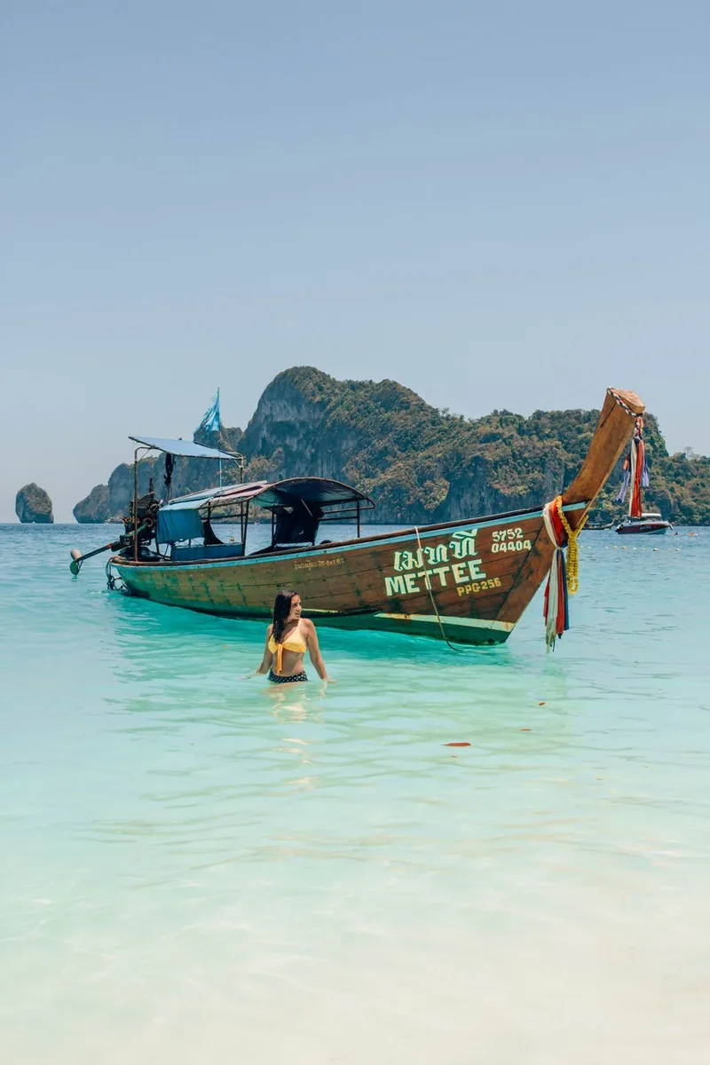 Thailand beach with longtail boat